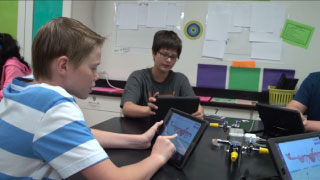 Students engaging with Gizmos